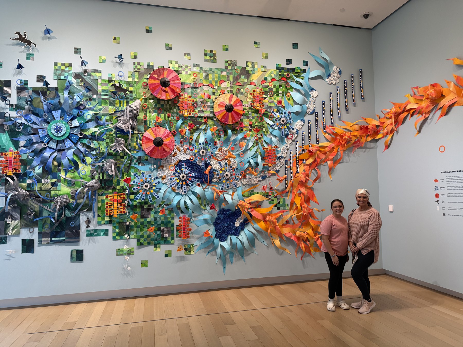 A family museum visit surrounded by colorful artwork